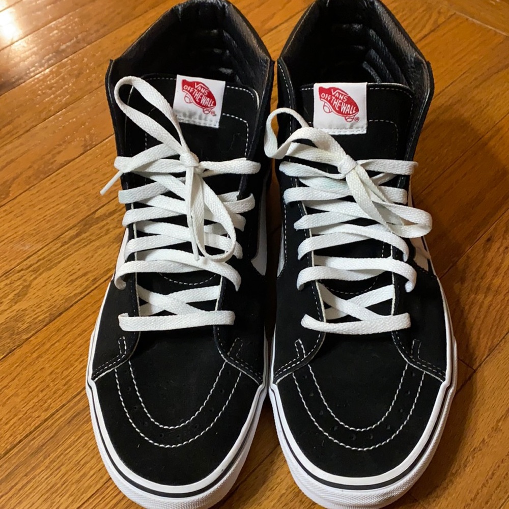 Black and white suede high top VANS
